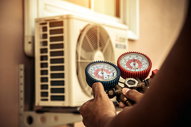Professional Heat Pump Repair technician working in San Joaquin, CA